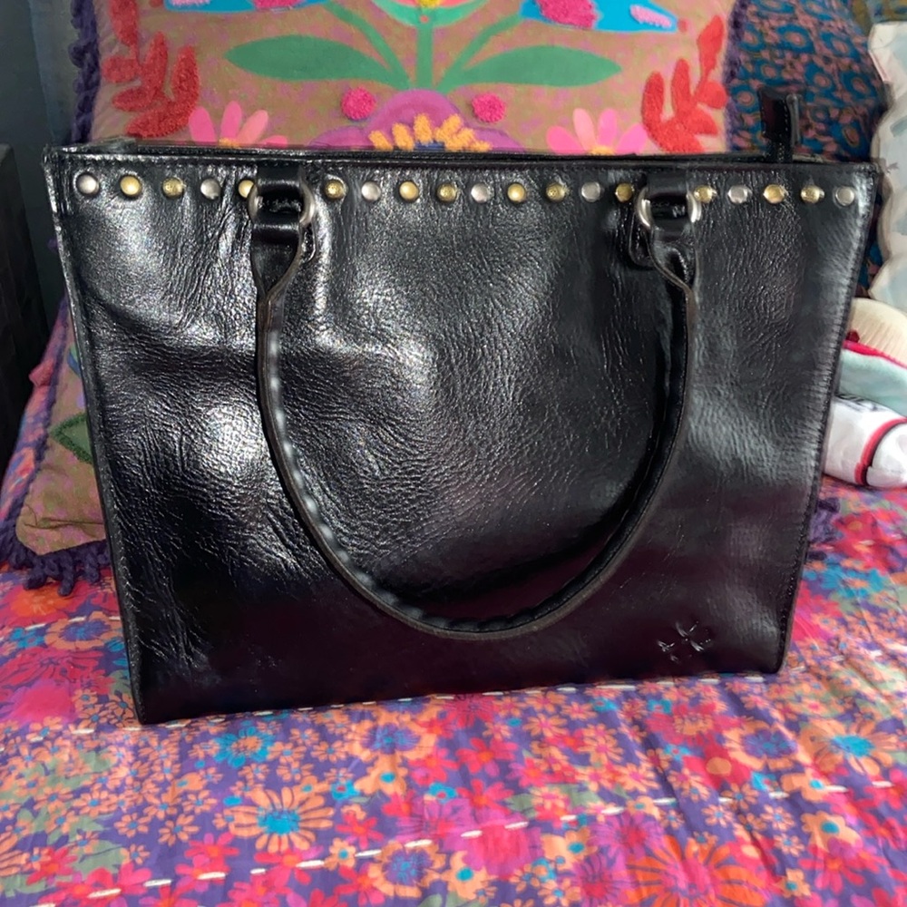 Barely used. In mint condition. Patricia Nash 100% leather. Black with silver